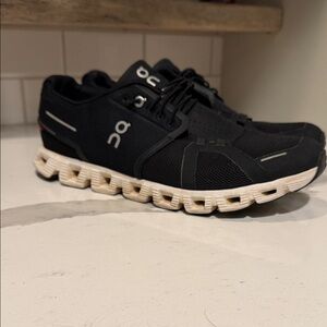 On Running Black Athletic Trainers with Cream CloudTec Midsole